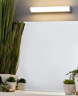 Nástenné svietidlá Lindby Kúpeľňové zrkadlové LED svetlo Philippa polkruh 32