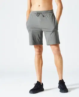 nohavice Pánske šortky na fitness 500 Essentials kaki