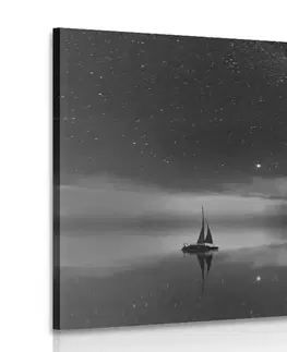 Čiernobiele obrazy Obraz loďka na mori v čiernobielom prevedení