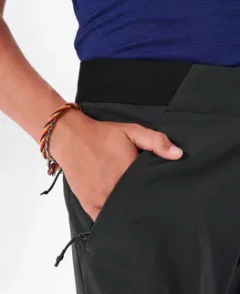 nohavice Detské turistické softshellové nohavice MH550 7-15 rokov čierne