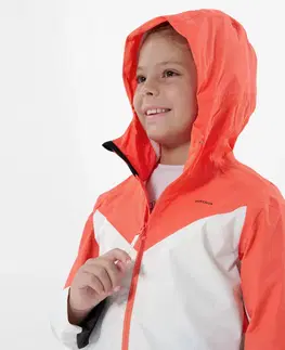 bundy a vesty Detská nepremokavá bunda na turistiku MH500 7-15 rokov béžovo-oranžová