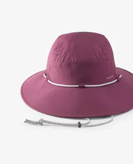 čiapky Dámsky trekingový klobúk MT500 s ochranou proti UV fialový