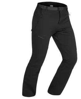 nohavice Pánske strečové nohavice SH500 X-Warm na zimnú turistiku hrejivé a vodoodpudivé