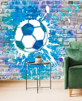 Samolepiace tapety Samolepiaca tapeta modrá futbalová lopta na tehlovej stene