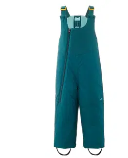 nohavice Detské hrejivé lyžiarske náprsenkové nohavice 500 Warm zelené