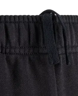nohavice Chlapčenské bežecké nohavice Puma s potlačou čierne