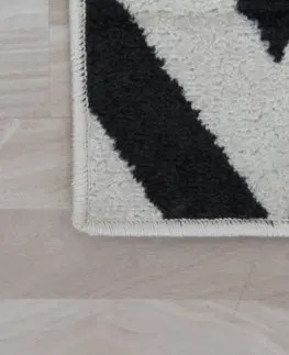 Koberce a koberčeky KONDELA Adisa koberec 133x190 cm slonovinová / tmavosivá