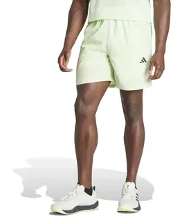 nohavice Pánske šortky na kardio fitnes zelené