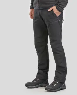 nohavice Pánske strečové nohavice SH500 X-Warm na zimnú turistiku hrejivé a vodoodpudivé