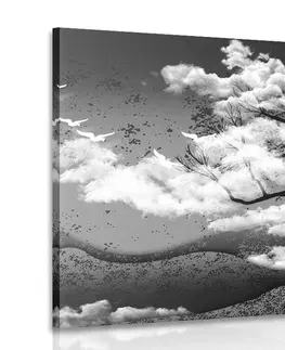 Čiernobiele obrazy Obraz čiernobiely strom zaliaty oblakmi
