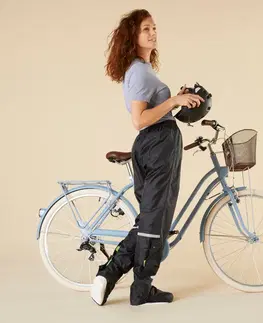 nohavice Vrchné cyklistické nohavice 100 do dažďa so všitými návlekmi čierne