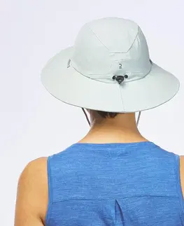 čiapky Dámsky trekingový klobúk MT500 s ochranou proti UV svetlozelený