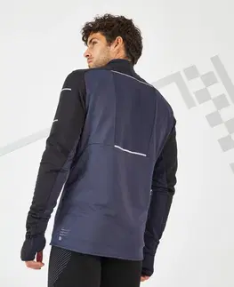 mikiny Pánske zimné bežecké tričko Kiprun Warm Regul s dlhým rukávom modro-čierne