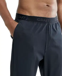 Pánske klasické nohavice Pánske tepláky CRAFT ADV Essence Training čierna - XL