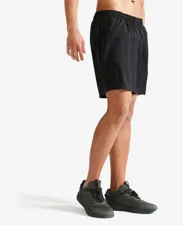 nohavice Pánske šortky 100 na fitness čierne