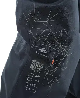 nohavice Detské turistické nohavice do dažďa MH500 7-15 rokov čierne