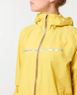 bežecké bundy a vesty Dámska nepremokavá trailová bunda do dažďa žlto-okrová