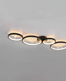Stropné svietidlá Trio Lighting Stropné svietidlo LED Groovy so štyrmi svetlami čiernej farby 3 000 K