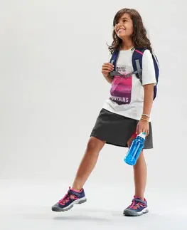 kemping Turistická sukňa so šortkami MH100 pre deti vo veku od 7 do 15 rokov sivo-ružová
