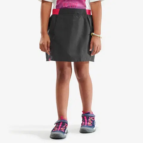 kemping Turistická sukňa so šortkami MH100 pre deti vo veku od 7 do 15 rokov sivo-ružová