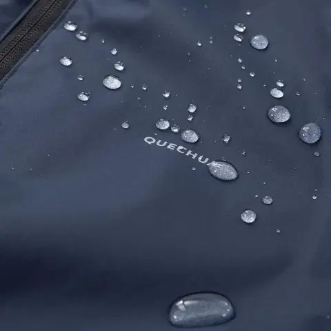 bundy a vesty Detská turistická nepremokavá bunda MH500 7-15 rokov tmavomodrá