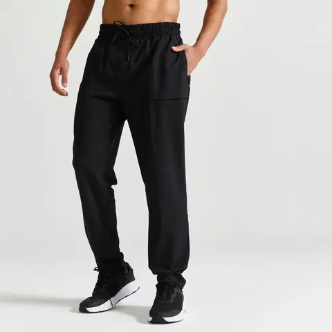 nohavice Pánske nohavice na fitness 500 čierne