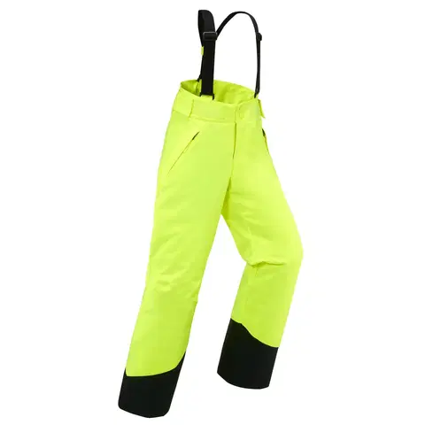 nohavice Detské lyžiarske nohavice PNF 500 nepremokavé s trakmi žlté