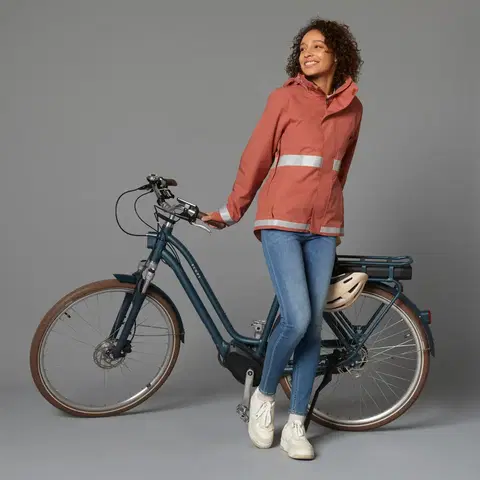 bundy a vesty Dámska hrejivá cyklistická bunda 540 viditeľná v tme tehlová