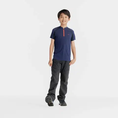 nohavice Detské turistické softshellové nohavice MH550 7-15 rokov čierne