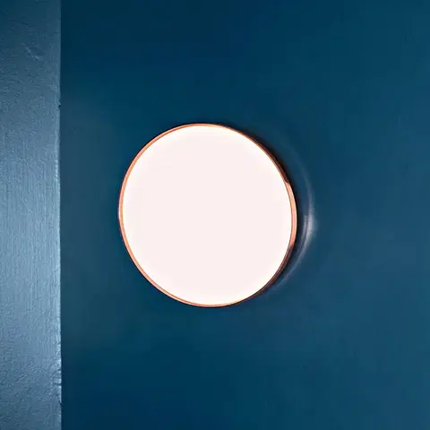 Nástenné svietidlá FLOS FLOS Clara – nástenné LED svetlo s medeným kruhom