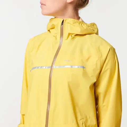 bežecké bundy a vesty Dámska nepremokavá trailová bunda do dažďa žlto-okrová